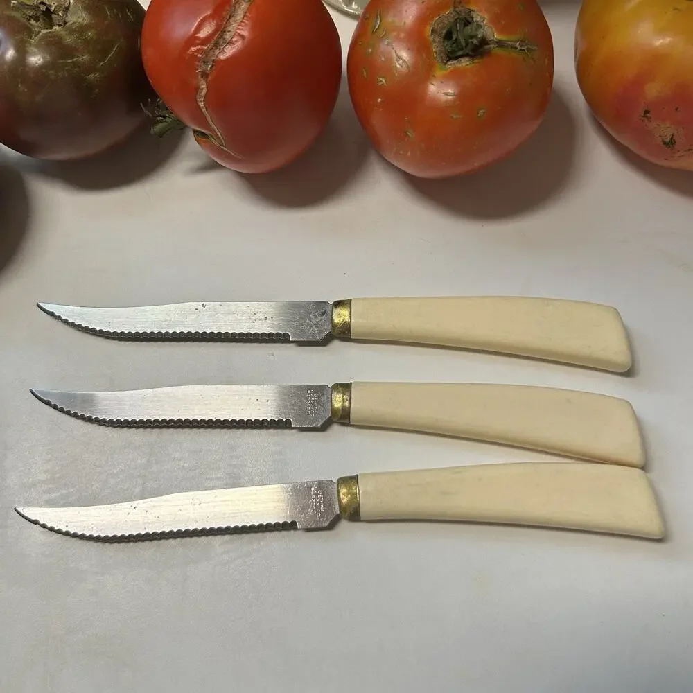 Vintage Quikut Quikkle serrated steak knives cream color handles Set Of 3 Used